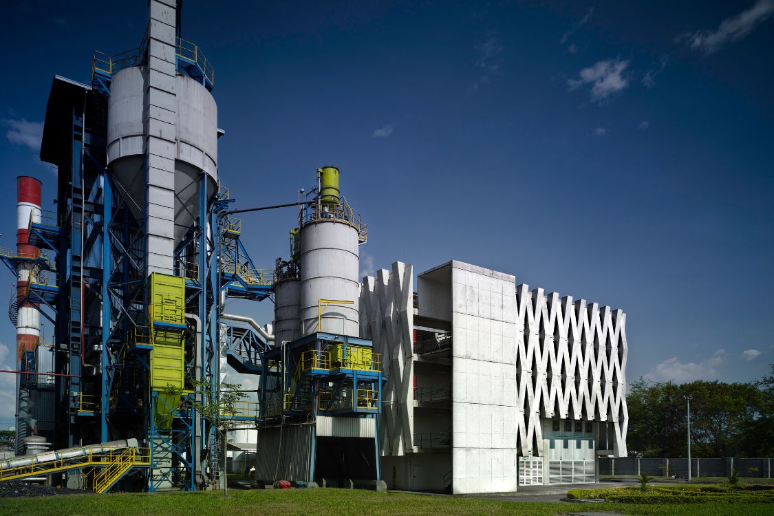 Argos Cement Plant - Modern industrial architecture building with concrete facade next to cement silos - Felipe Gonzalez Pacheco.jpg